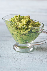 Guacamole in glass gravy-boat