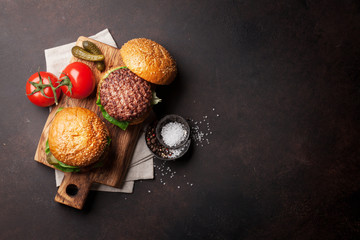 Obraz na płótnie Canvas Tasty grilled home made burgers