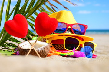 two red hearts romantic beach concept background
