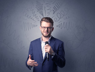 Businessman holding microphone
