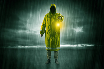 Man walking in storm with lantern