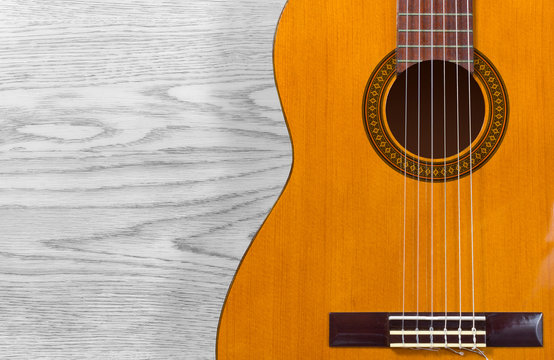 Classical Guitar over a Wooden Texture