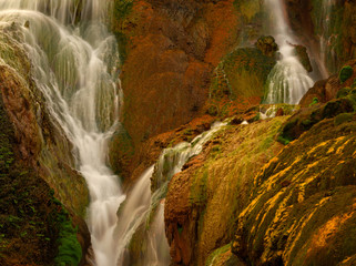 Naklejka na ściany i meble The beautiful colored Golden waterfall in North Taiwan.