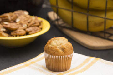 Classic Banana Nut Muffins on a Slate Cutting Board