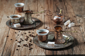 Oriental/Bosnian/Turkish coffee served in copper-plated pot with Turkish delight.