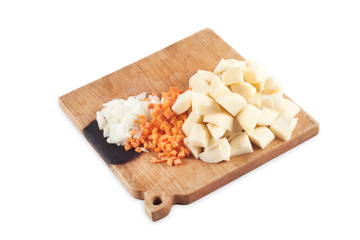 sliced vegetables on a board