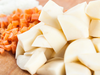 sliced vegetables on a board
