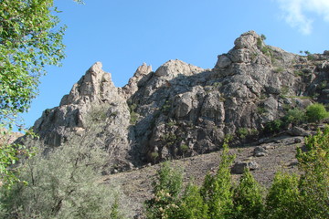 landscape of the Crimean rocks against the background of the blue sky.