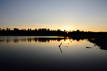 Obraz na płótnie Canvas Lake at sunset