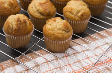 Classic Banana Nut Muffins on a Slate Cutting Board