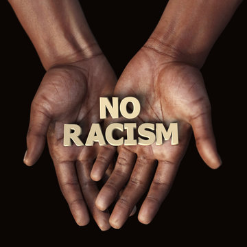 African hand with text No Racism