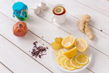 cold tea fruits on white wooden table