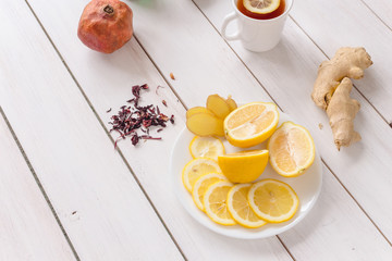 cold tea fruits on white wooden table
