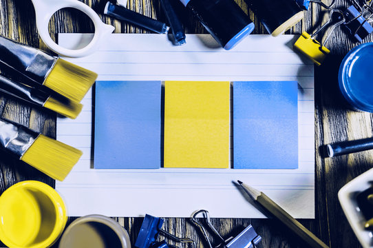 ack to school background with school supplies on wooden background.