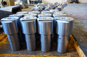 Naklejka premium white metal cylindrical parts after machining on the milling and lathe