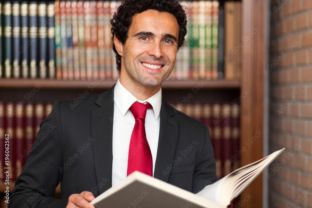 Wall mural lawyer reading a book