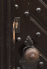 The front door closeup. Keyhole and handle