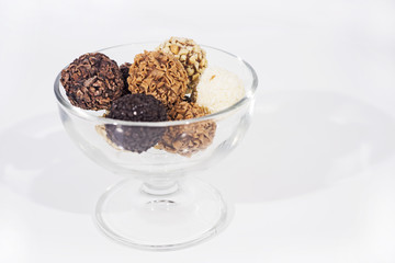 Sweet chocolate candies balls with nuts.