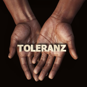 Afrikanische Hand mit Text Toleranz