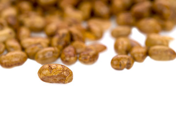 Roasted soya beans on a white background