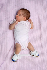 Newborn with Club Foot Wearing Orthopedic Shoes