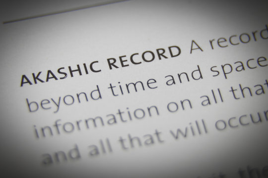 The word Akashic Record close up on paper