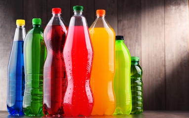 Plastic bottles of assorted carbonated soft drinks