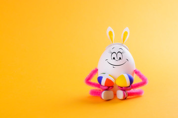 Egg girl wearing bunny ears with pointed Easter eggs