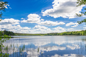 Lake in Belarus. Clouds in the reflection