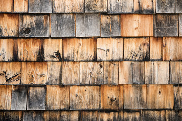 A shingled wall for a texture and patterned background.