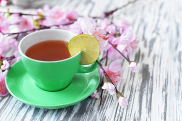 morning breakfast of tea in a cup of pink flowers