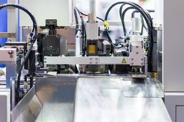 Detail of industrial machine working in factory