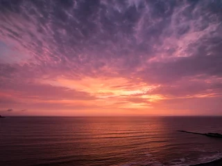 Fototapeten Sonnenuntergang in rosa Farbe © stbaus7