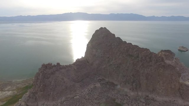 Orbiting Alien Rock High Over Desert Lake and Islands