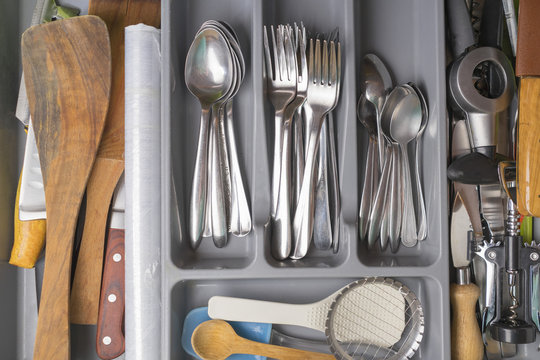 metal cutlery in the drawer. kitchenware