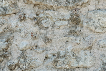 Granite texture, stone wall surface closeup