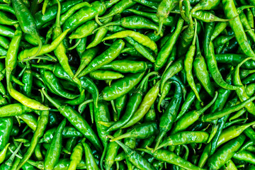Green chili peppers, natural food  background