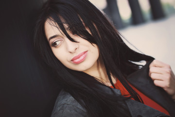 Fototapeta premium Portrait of a beautiful and stylish brunette girl.