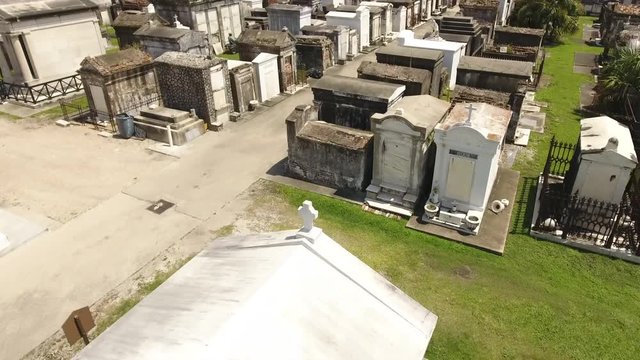 Mowing The Lawn In Old And Urban New Orleans Cemetery