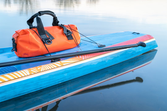 waterproof duffel on stand up paddleboard