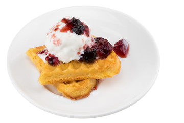 Plate of belgian waffles with ice cream and jam on white background