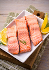 Steamed salmon fish fillet on white plate. Clean eating, healthy and diet food concept