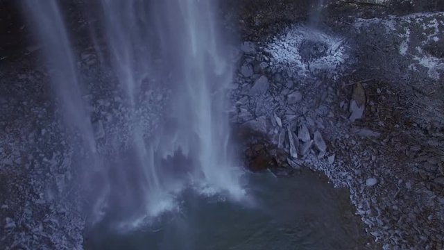 4k Aerial Snow Tennessee Waterfall Base 003 Tilt Up