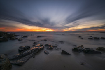 Rocky seascape sunset in San Diego, California 