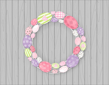 Easter eggs wreath hanging on Wooden rustic background - cs3 