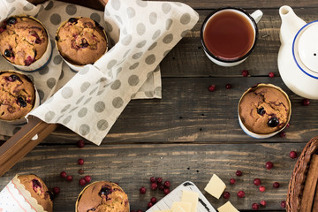 Fototapeta na wymiar Muffins with cranberries and white chocolate