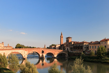 Verona cityscape with Ponte Pietra on Adige river with historical buildings