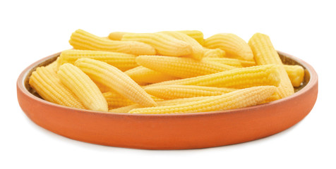 Plate with fresh young baby corn on white background