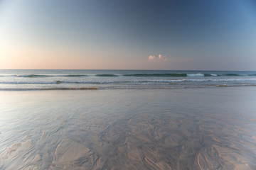 Sunset beach in Cornwall Newquay with low tide