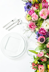 Place setting spring flowers white background Table decoration